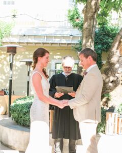 A photo of a couple during their ceremony at one of the best Sonoma wedding venues.
