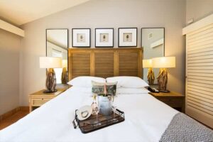 A guestroom at a Sonoma hotel to relax in after visiting a local wine bar.
