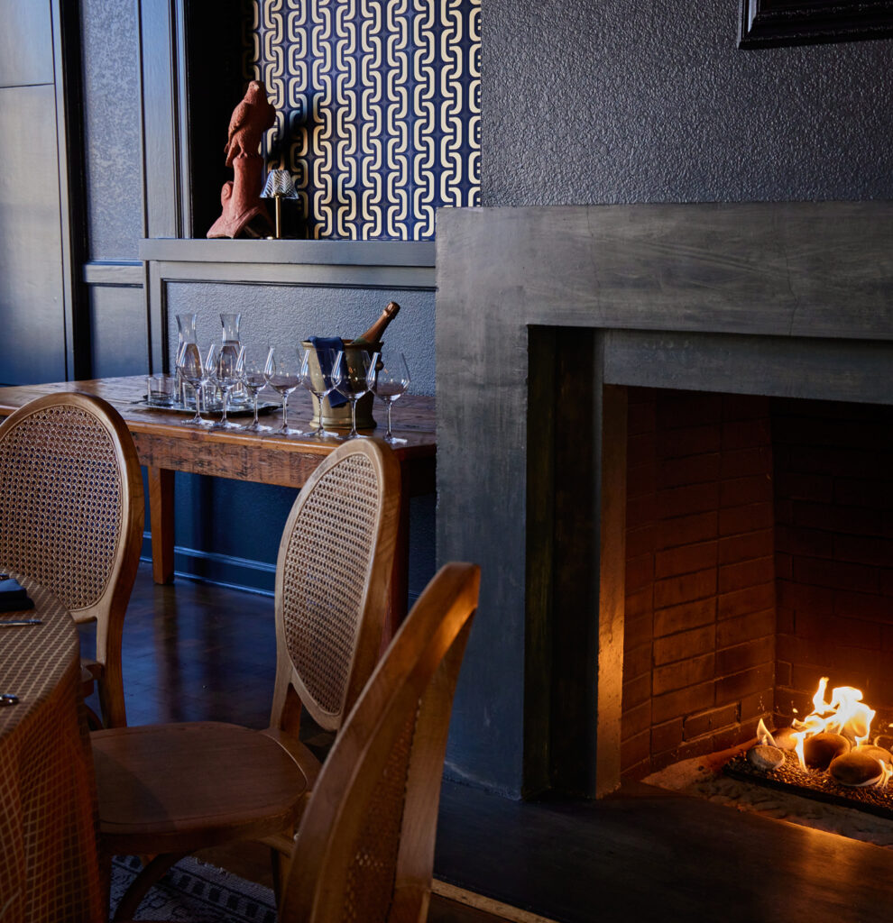 Fireplace Room at El Dorado ready for event with champagne
