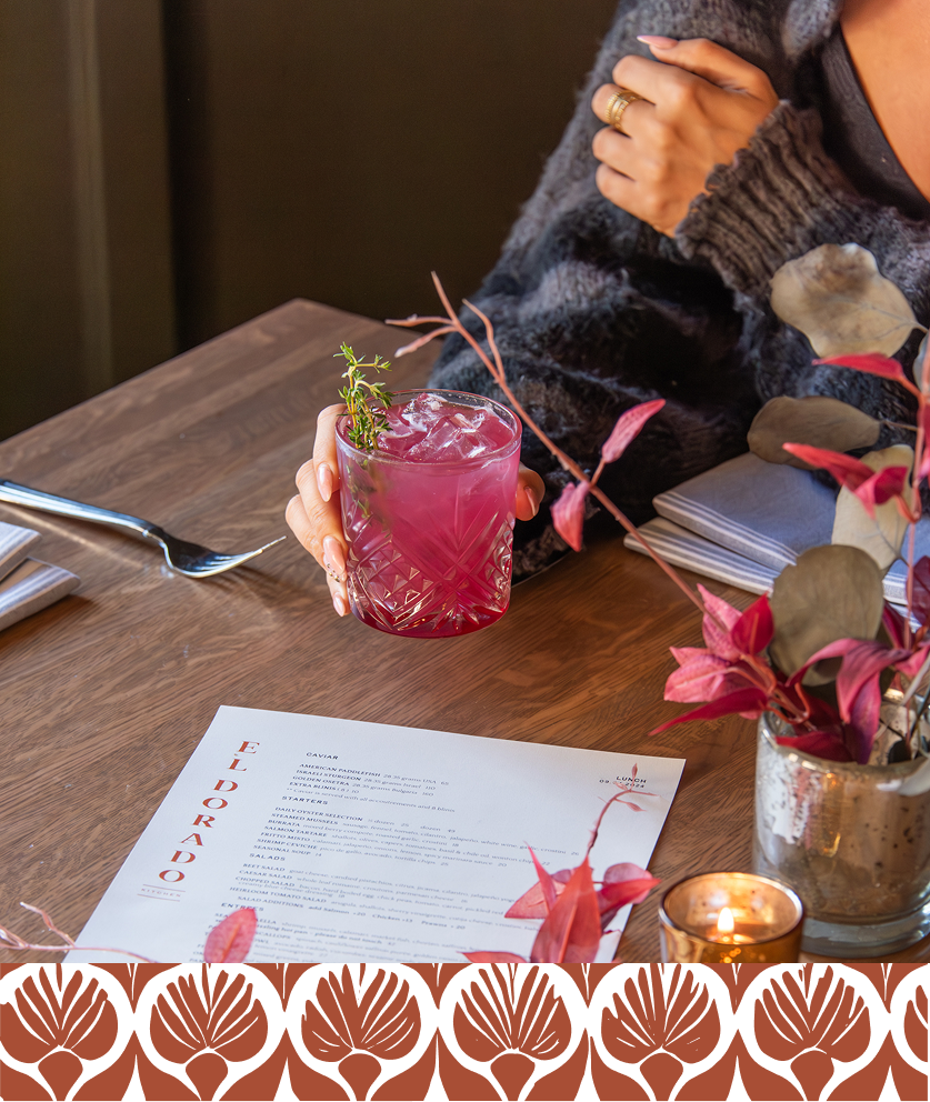 El Dorado Kitchen menu and guest with a festive cocktail